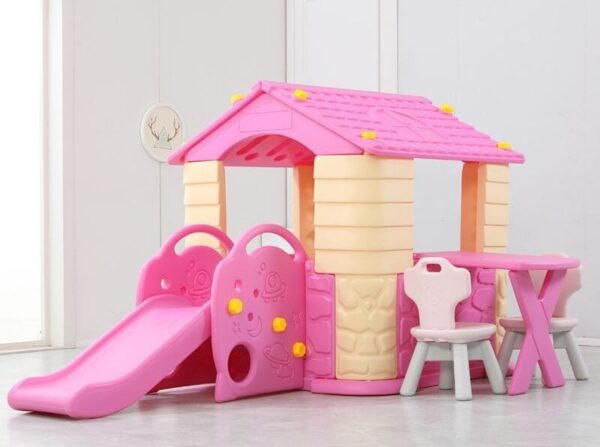 Pastel pink toddler cubby house with slide and matching table chairs